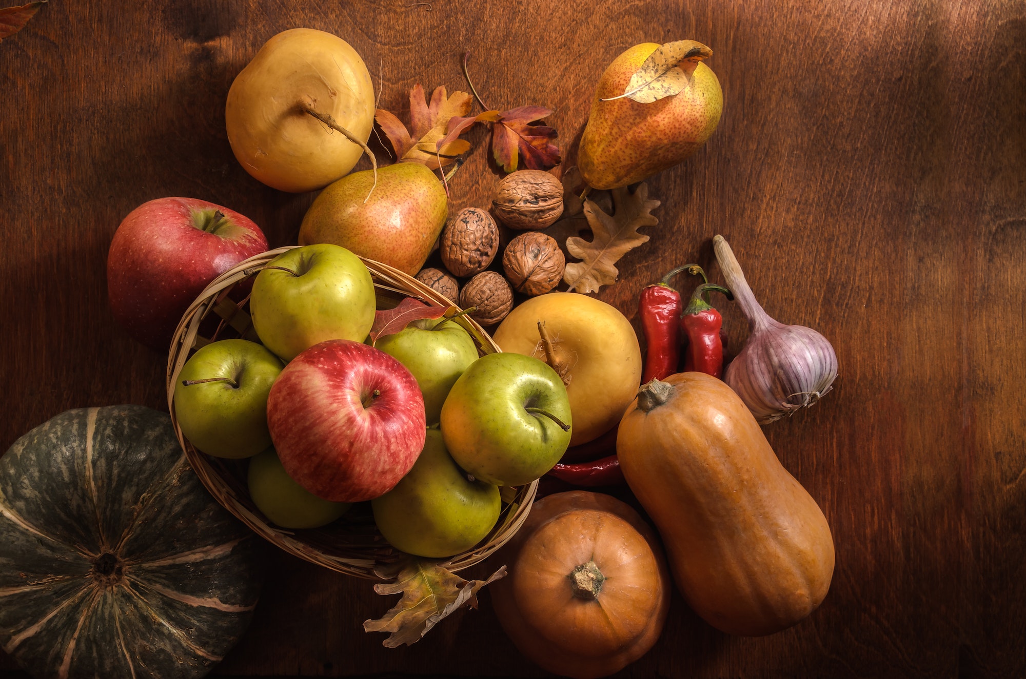 Fruits and vegetables on a dark wooden background