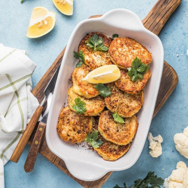 Vegan cauliflower vegetable fritters on the kitchen tVegan cauliflower vegetable fritters on the kit